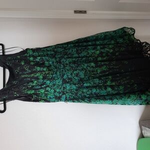 Green and black mid calf length dress